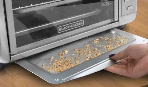 Toaster oven crumb tray cleaning